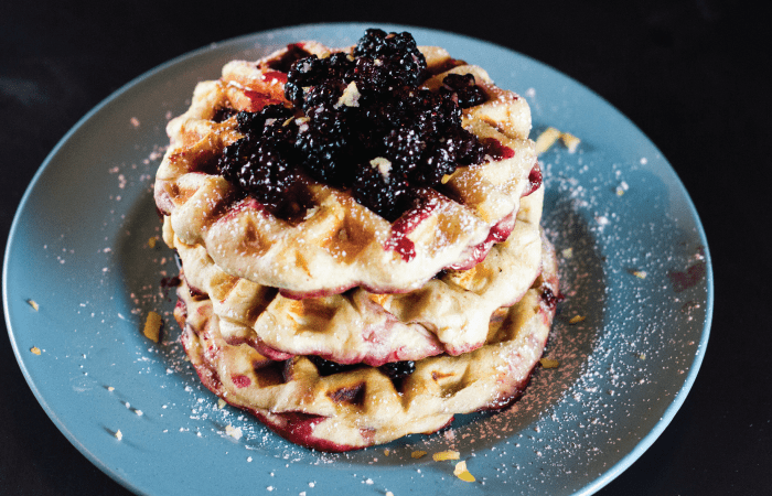 Blackberry Stuffed Waffles on blue plate