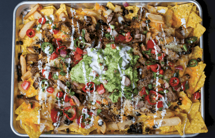 overhead shot of Loaded Monster Carne Asada Nachos