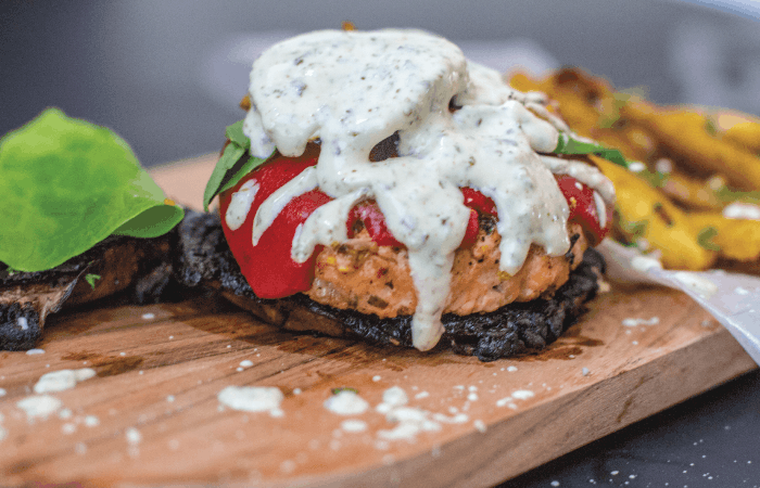 Portobello Mushroom & Salmon Burger doused in goat cheese aioli