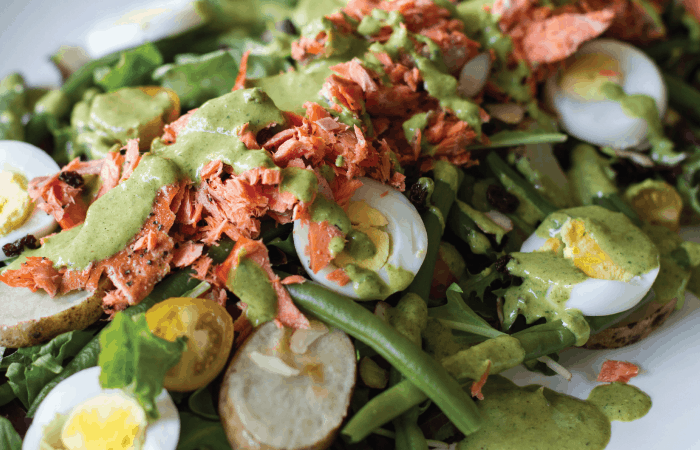 Mediterranean Salad with boiled eggs, green beans, and smoked salmon