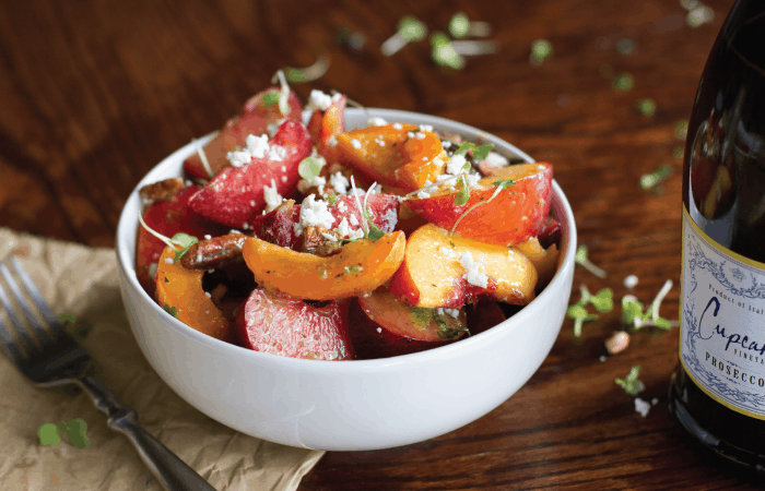 Summer Stone Fruit Salad with Jalapeno & Prosecco Vinaigrette in a bowl