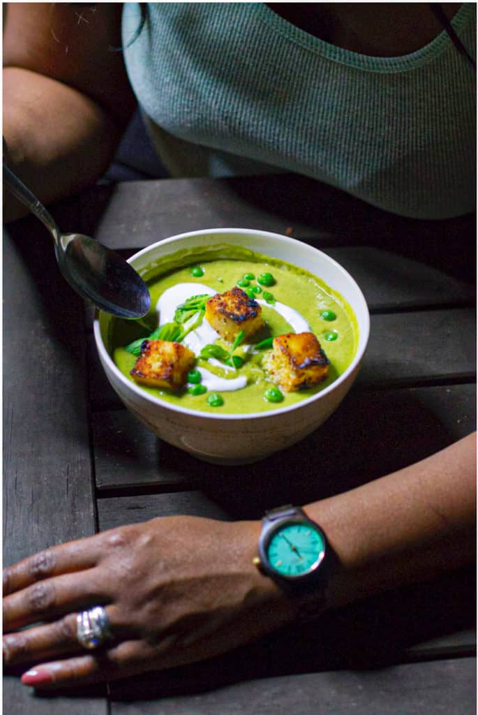 bowl of pea & mint soup with cornbread croutons