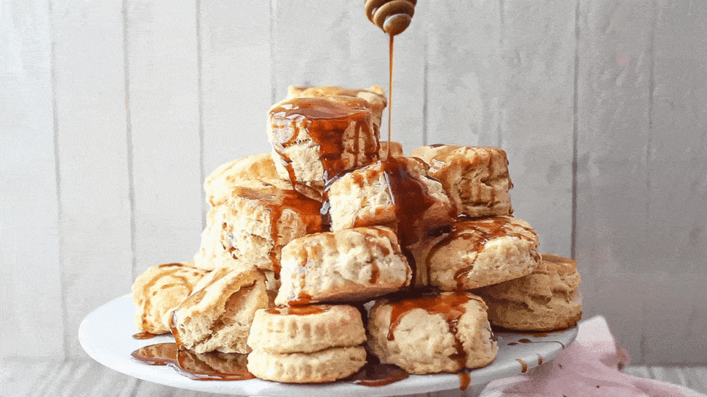 Buttermilk biscuits drizzled with hot buttered rum sauce.