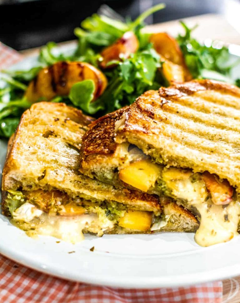 close up Grilled Peach Panini with a grilled peach salad plated