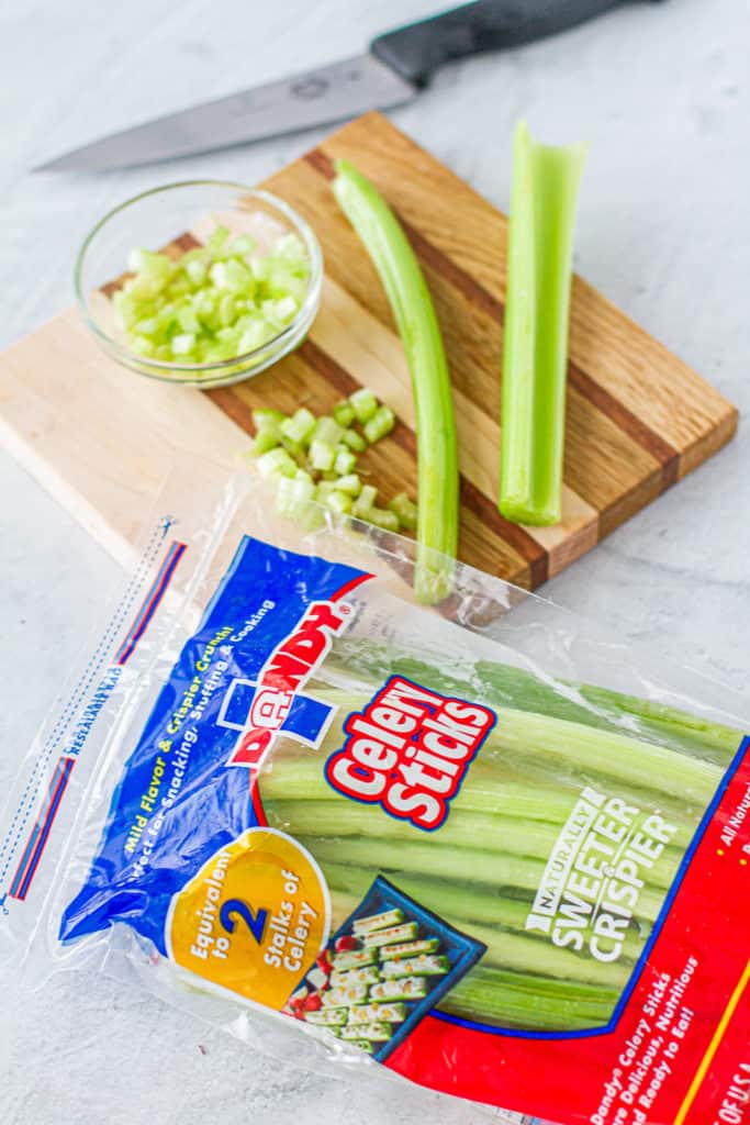 chopped celery on cutting board