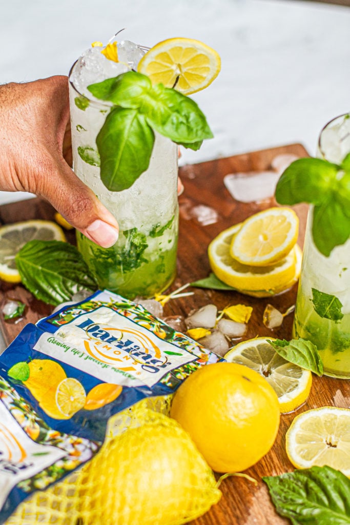 lemons and cup of lemon basil mojito