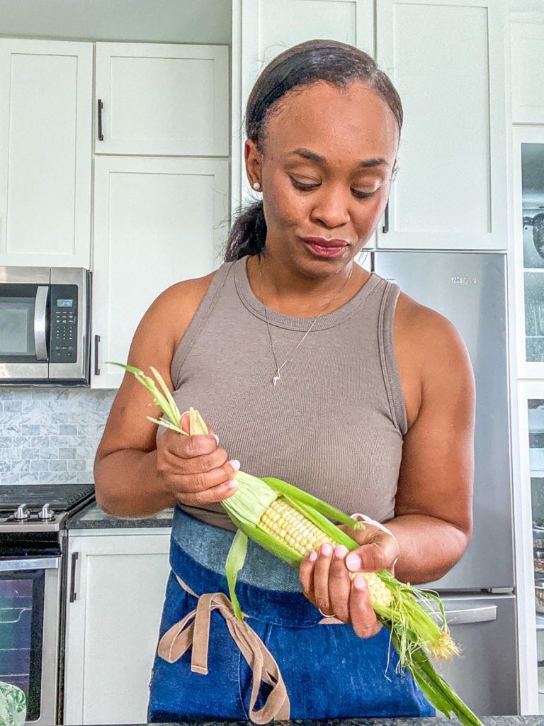 meiko temple shucking ear of corn