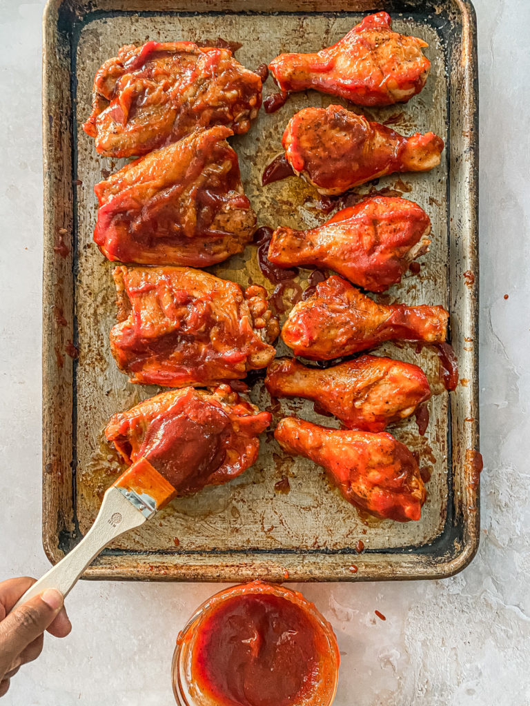 kansas city bbq wings being brushed with sauce