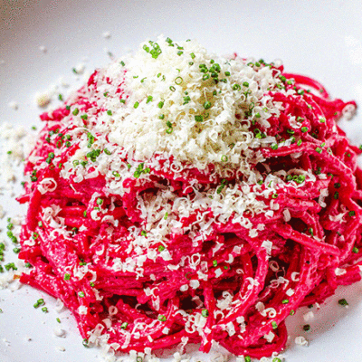 spaghetti with pink pasta sauce with parmesan gif