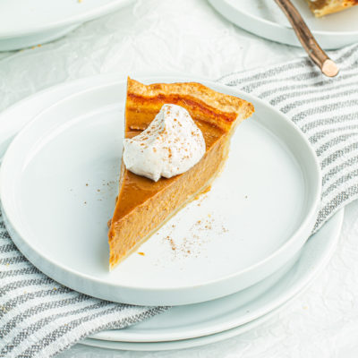 single slice of pumpkin spice latte pie on white plate