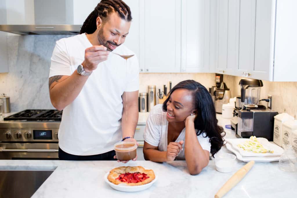 meiko and kenneth temple in kitchen with dessert