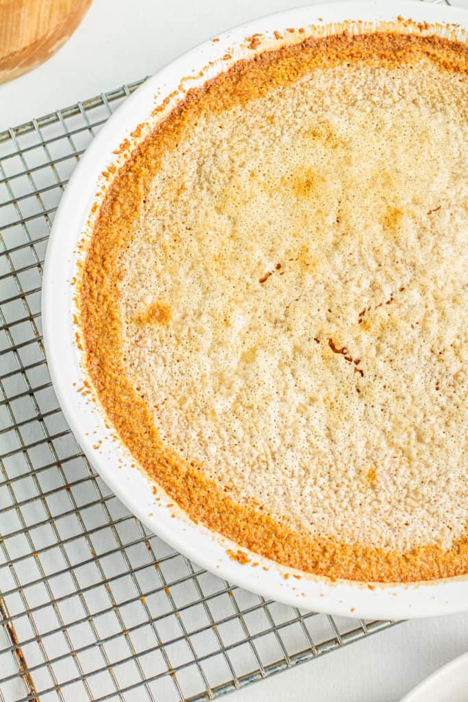 Freshly baked goatmilk pie cooling on rack