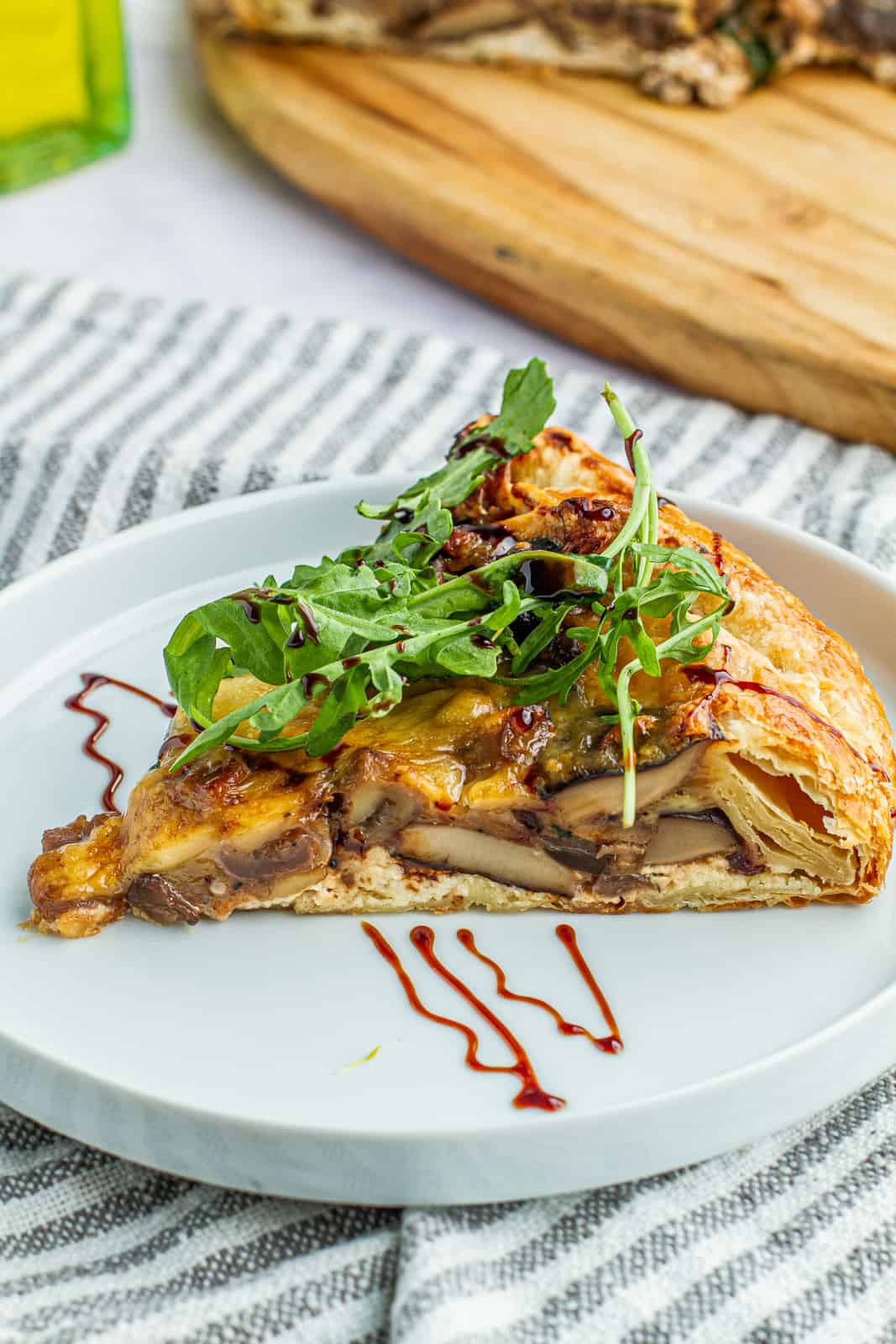 slice of mushroom and onion galette balsamic glaze