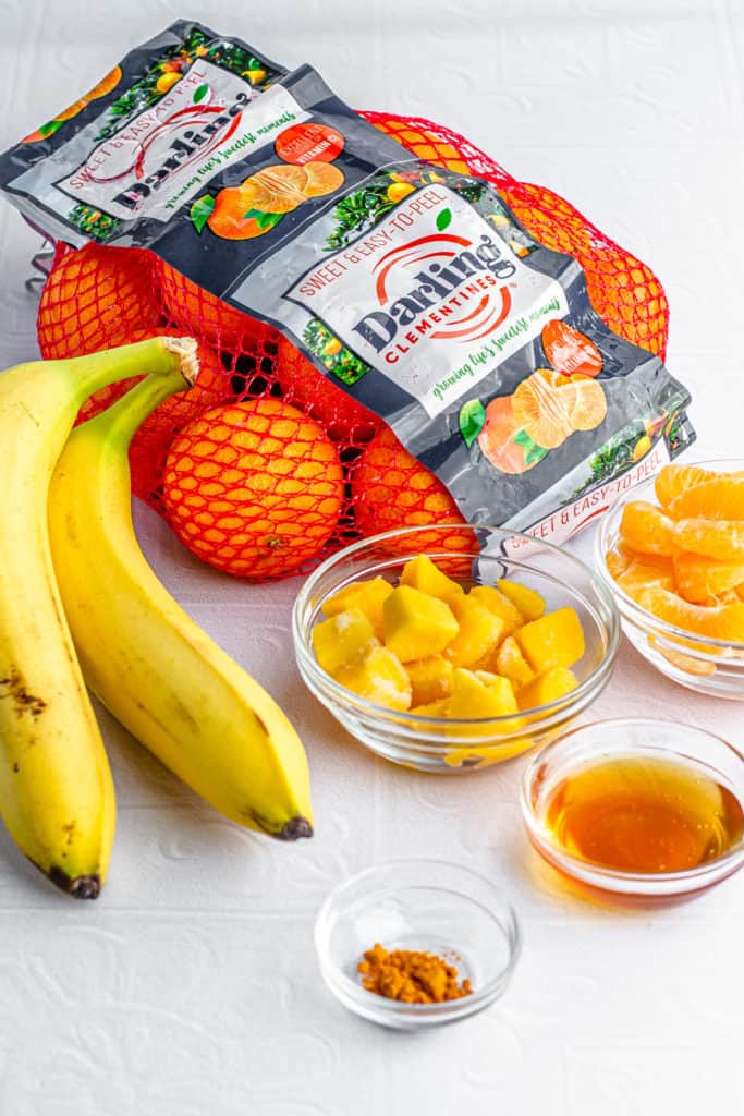 darling clementine, chopped mangos, bananas, honey, and turmeric