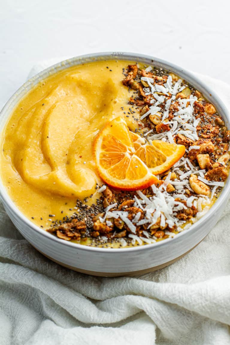 close up of clementine sunshine smoothie bowl