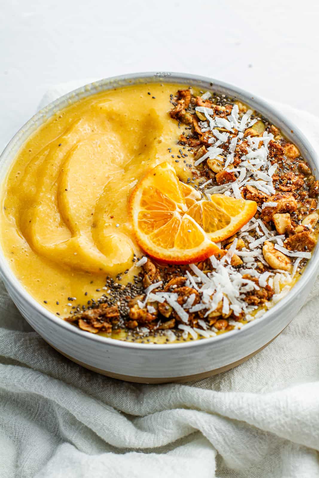 close up of clementine sunshine smoothie bowl