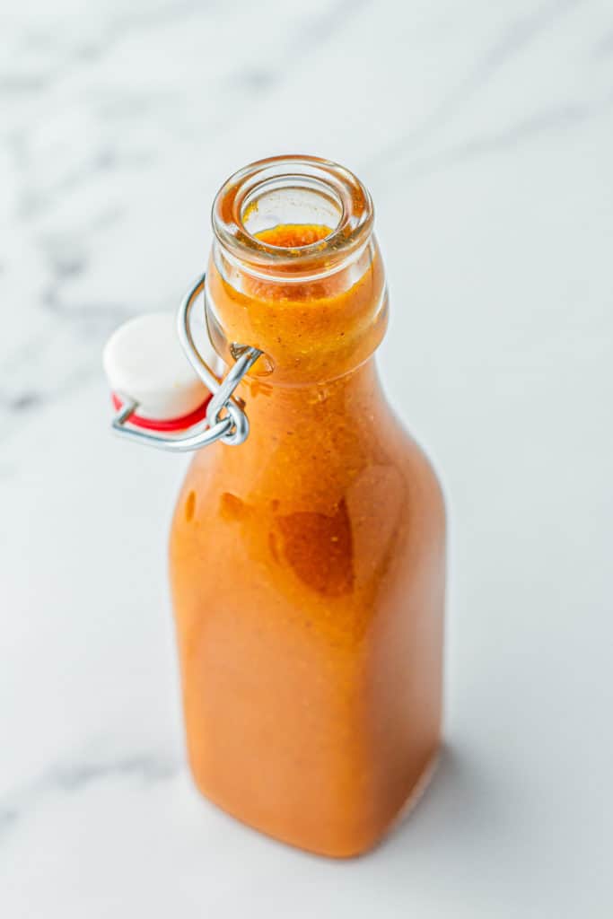 Homemade Mango habanero sauce in bottle