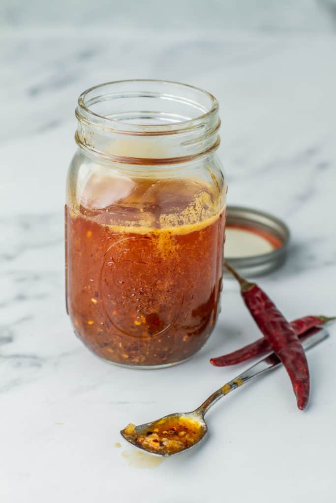 Mason jar of Hot Honey Lemon Pepper Sauce