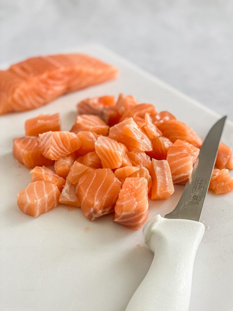 Fresh salmon chopped up for burgers