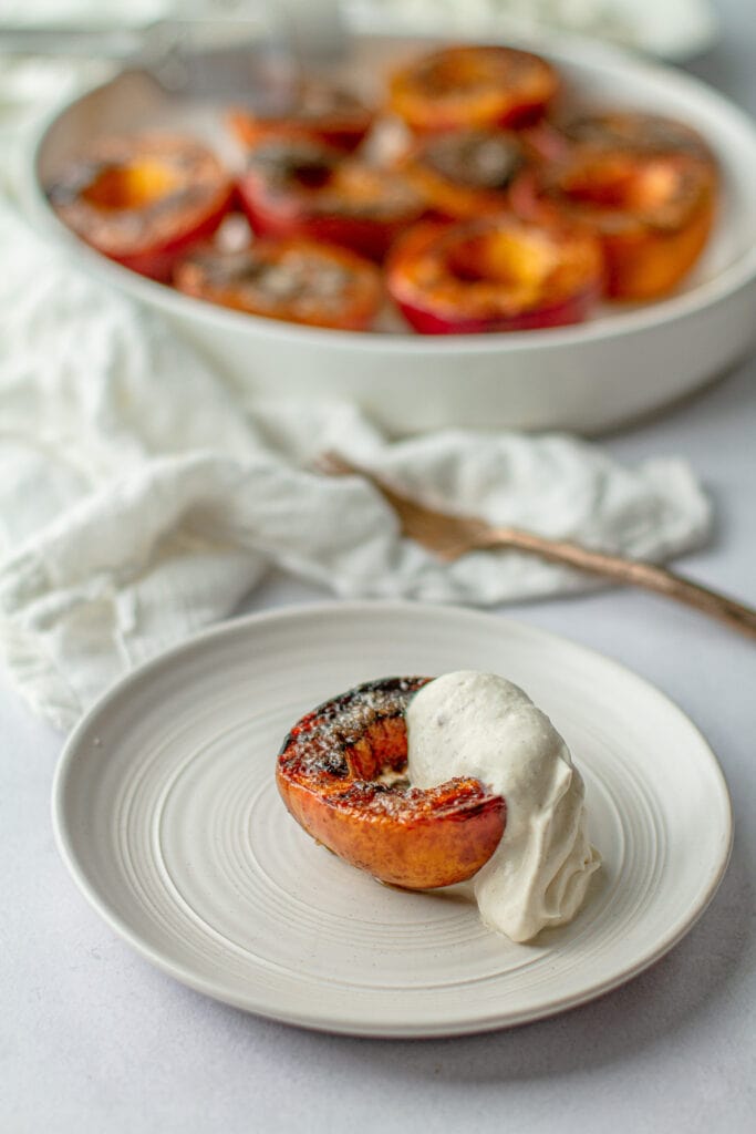 Brown Sugar Grilled Peaches on plate and platter