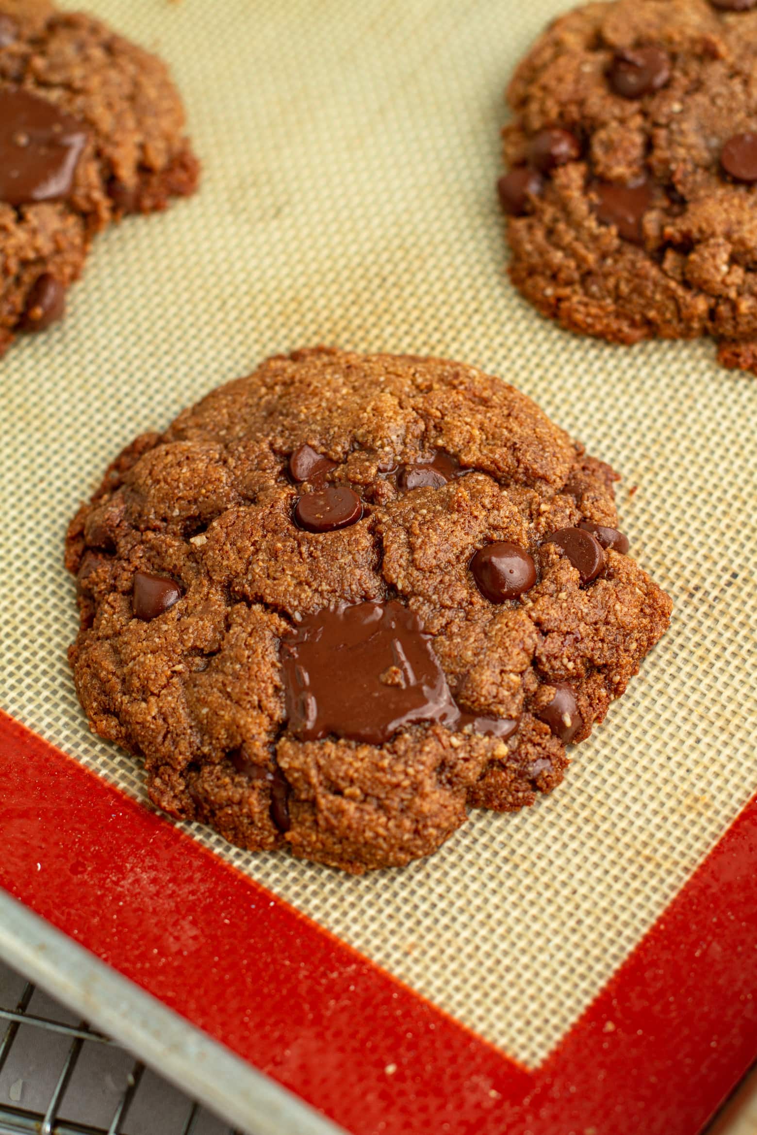 close up Brown butter almond flour chocolate chip cookies on a cookie sheet