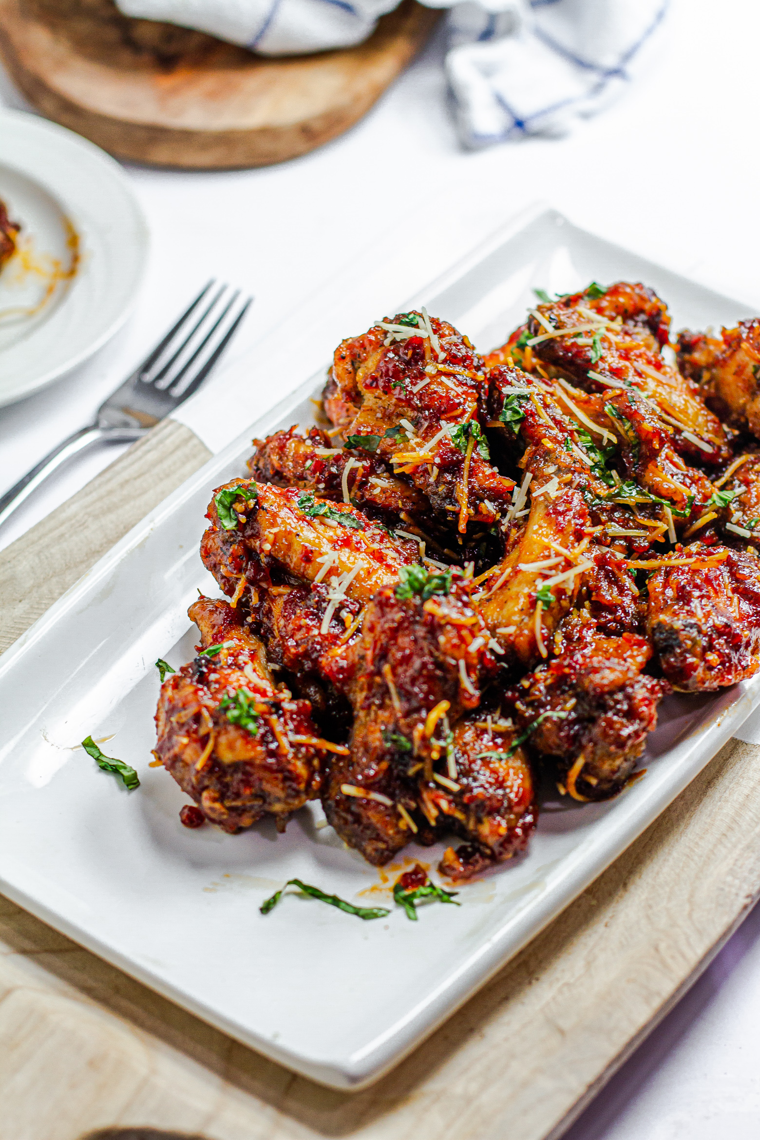 a platter of sun-dried tomato sticky wings